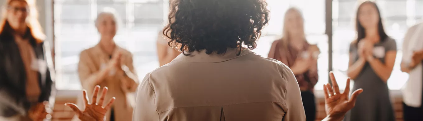 Group of colleagues applauding 