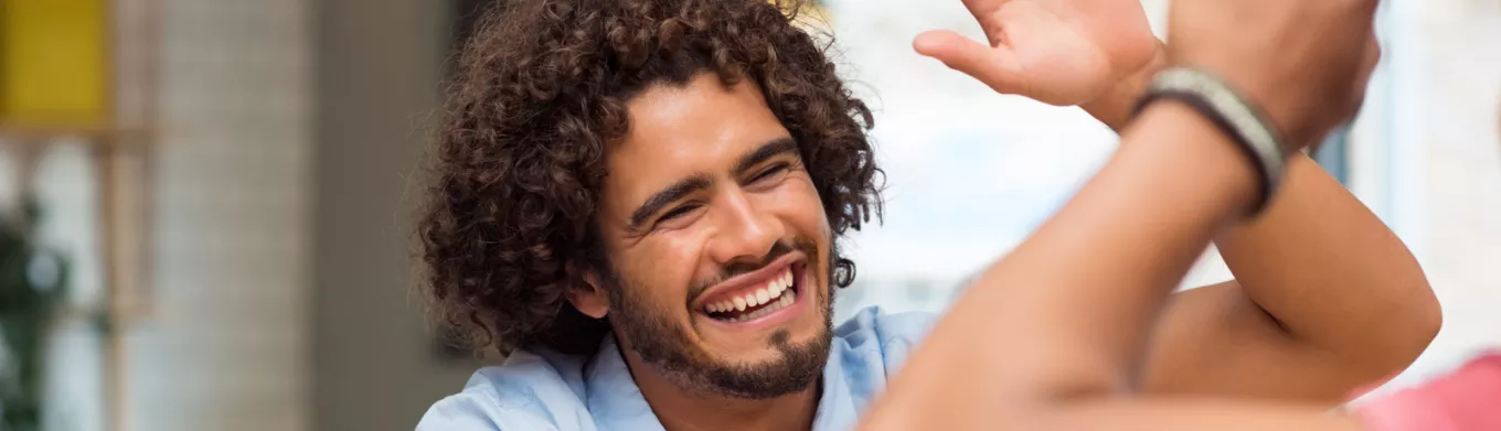 colleagues giving each other a high five 