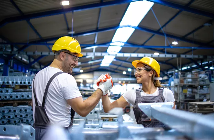Man and woman as a team in a factory