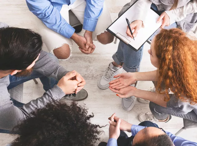 group of people having a conversation 