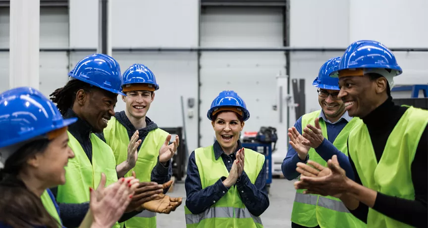 group of people in a warehouse 