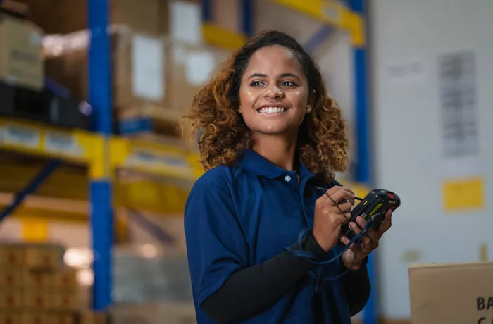 smiling woman doing inventory