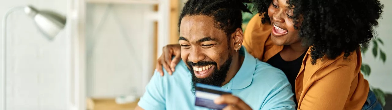 Man and woman shopping online