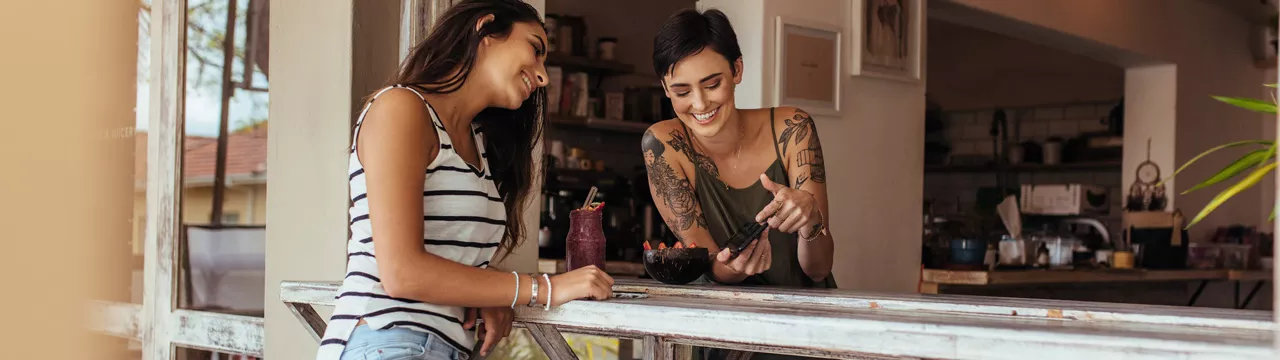 two women at a cafe