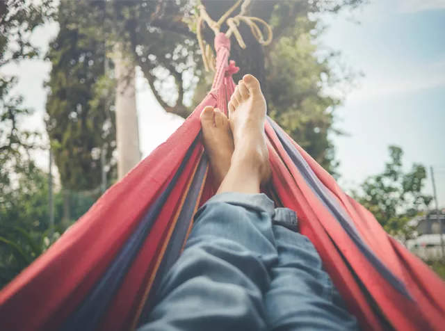 feet of a person in a hammock