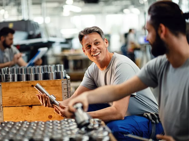 men in a factory