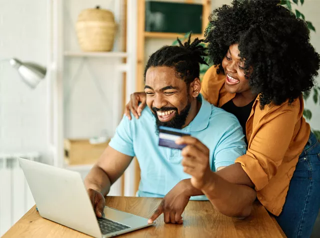 man and woman buying online