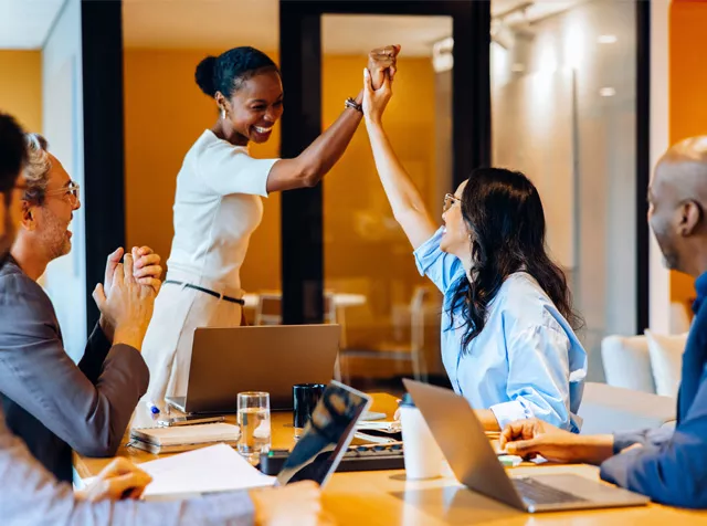 group of colleagues celebrating each other