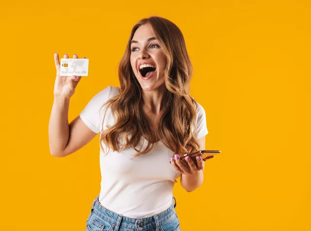 woman holding bank card