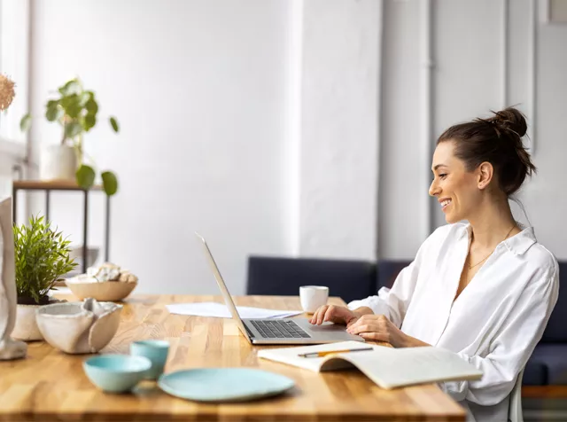 smiling woman working from home