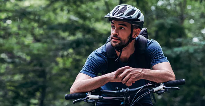 Man riding bike in the woods