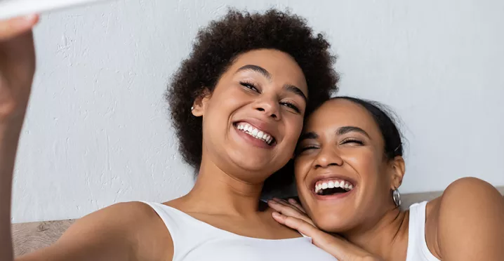 women smiling and happy
