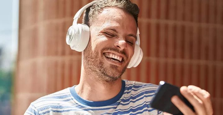 happy man listening to music
