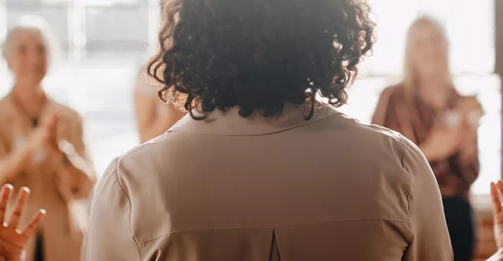 Group of colleagues applauding
