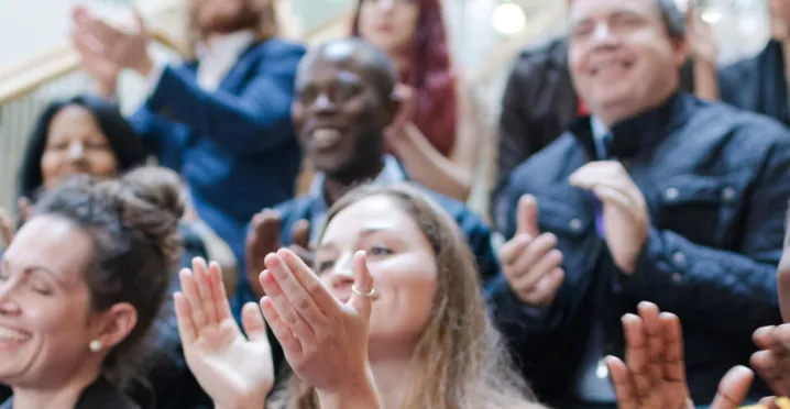 Group of people clapping