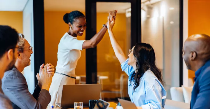 Group of colleagues celebrating each other