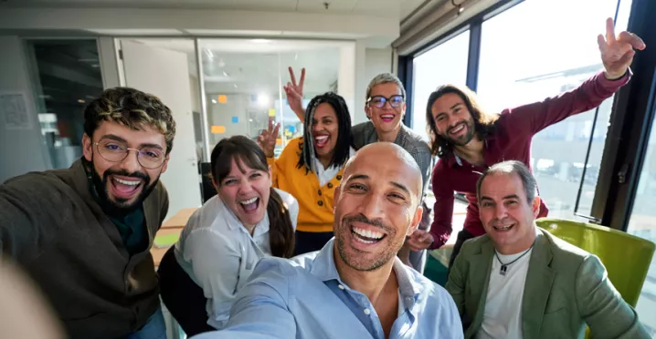 Group of people at work takin g a selfie