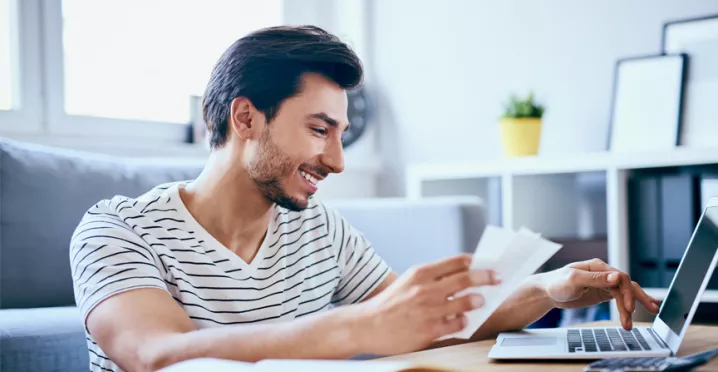 man getting to grips with his bills