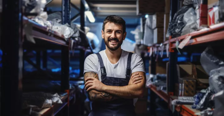 Man smiling in warehouse