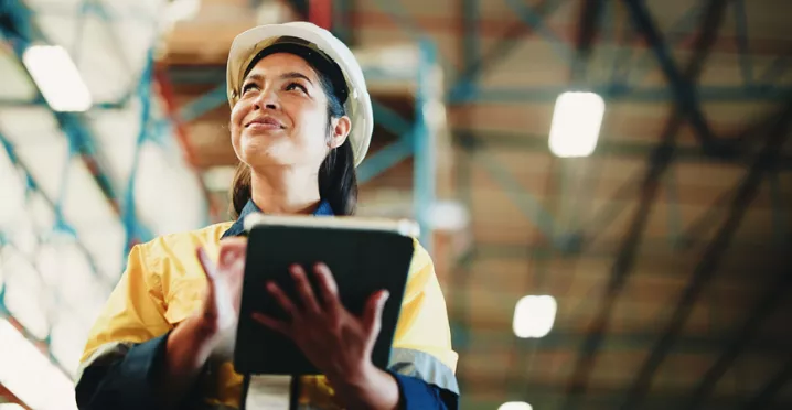 woman with clipboard in warehouse