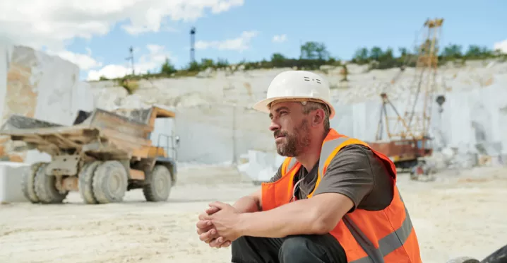 man sitting down in a quarry