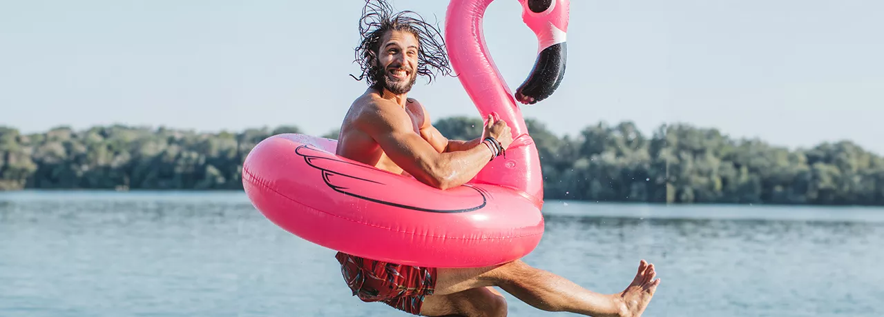 man jumping to water