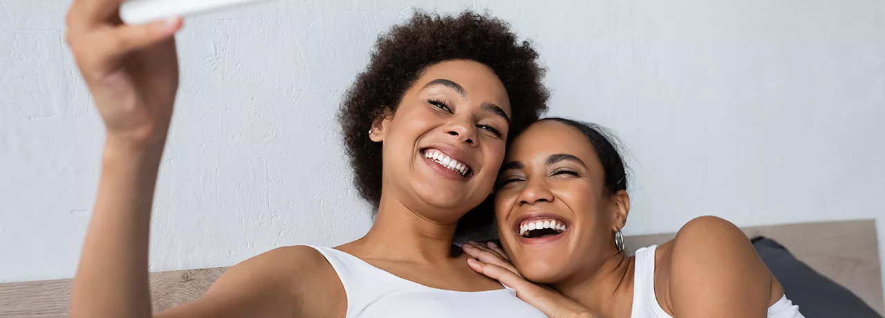 women smiling and happy
