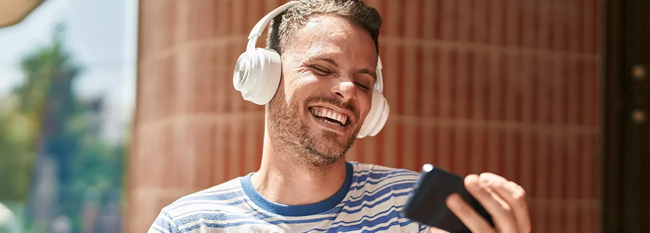 happy man listening to music
