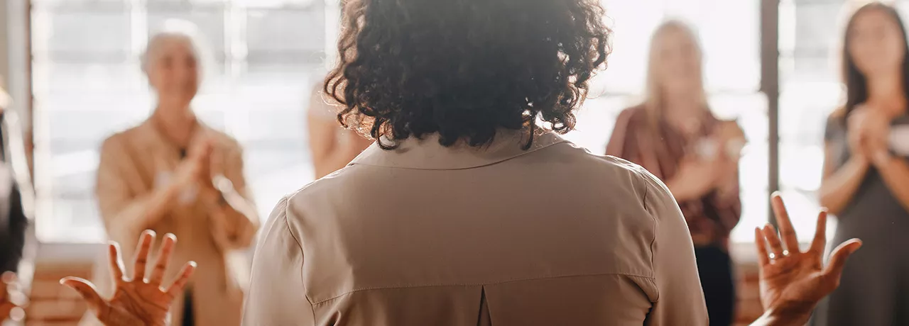 Group of colleagues applauding