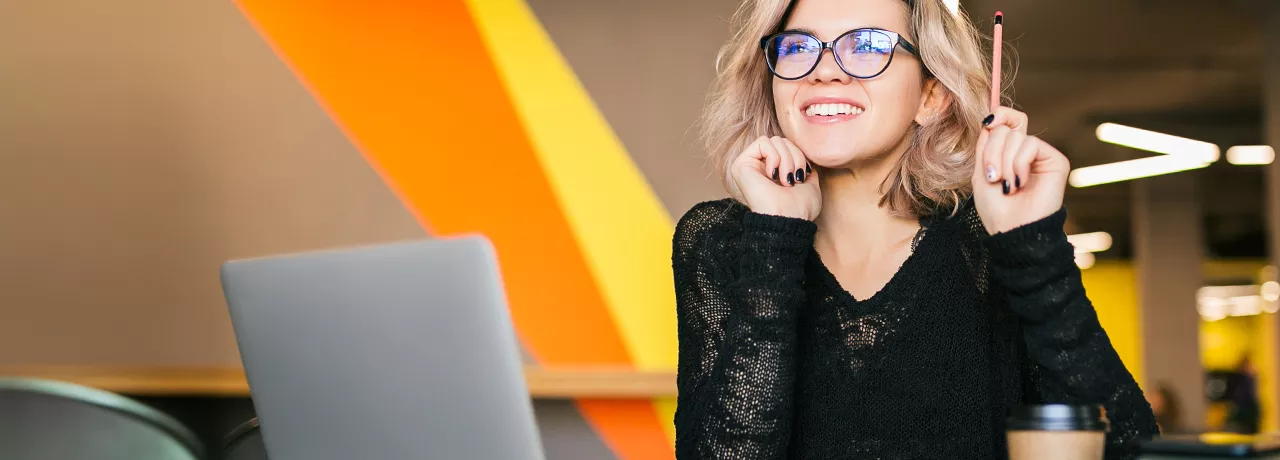 Happy employee smiling at work