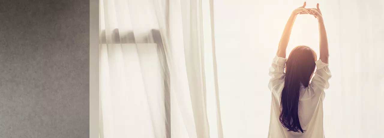 Woman stretching and looking relaxed