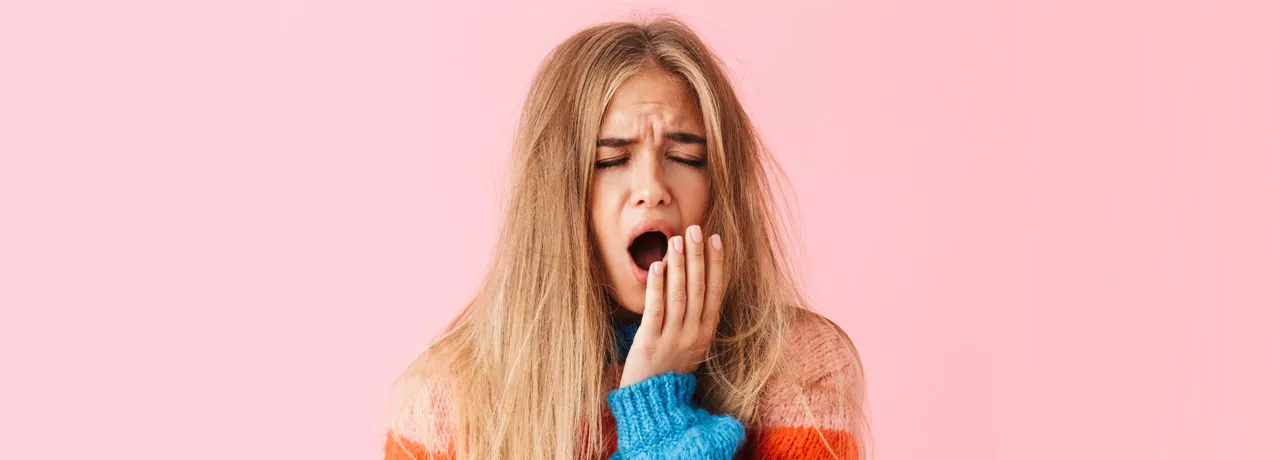young lady yawning