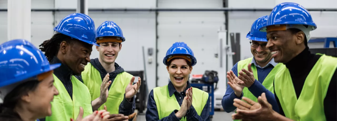 group of people in a warehouse
