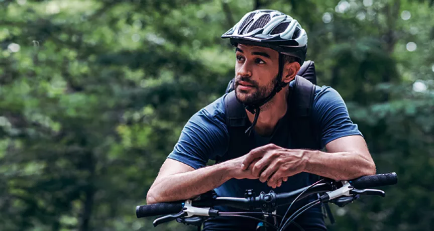 Man riding bike in the woods
