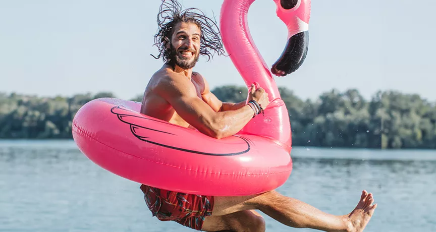 man jumping to water