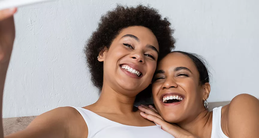 women smiling and happy