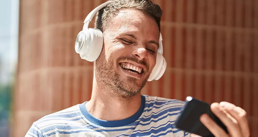 happy man listening to music