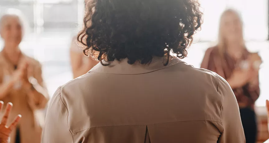 Group of colleagues applauding