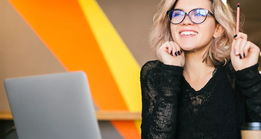 Happy employee smiling at work