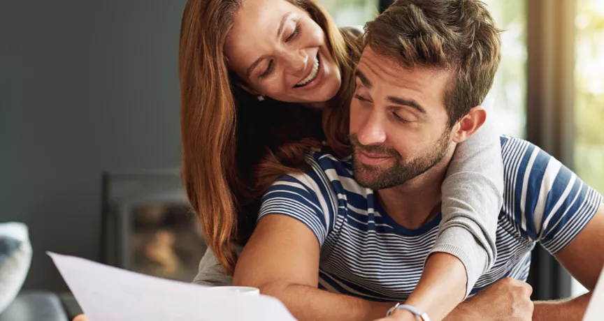 Man and woman checking their finances