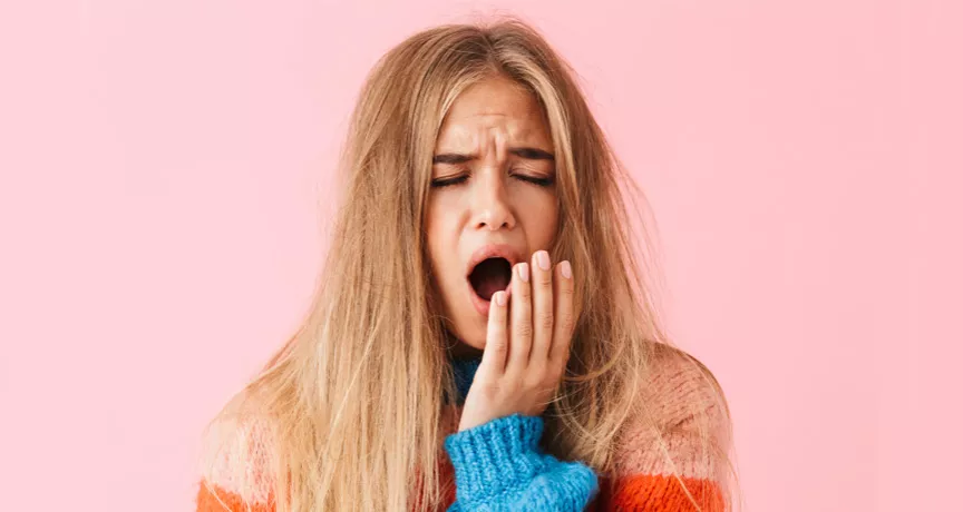young lady yawning