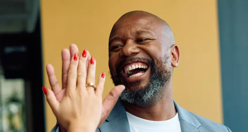 People in the office giving a high-five