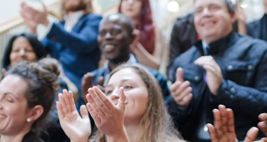 Group of people clapping