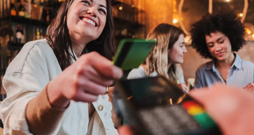 paying for a meal with a card