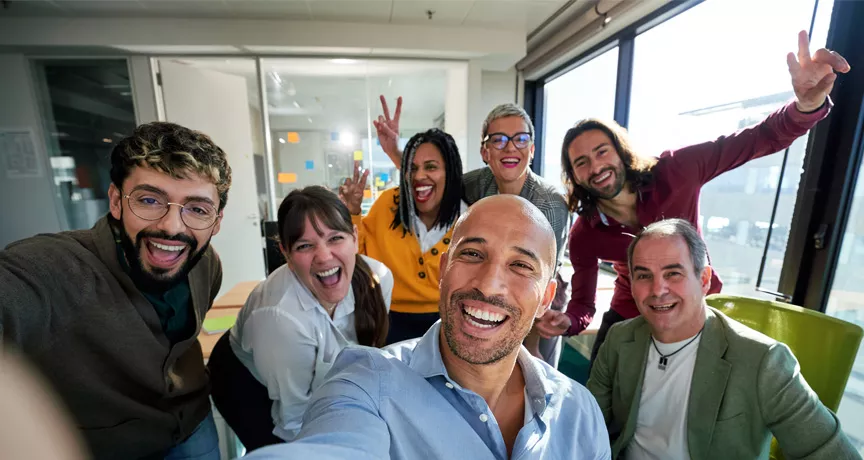 Group of people at work takin g a selfie
