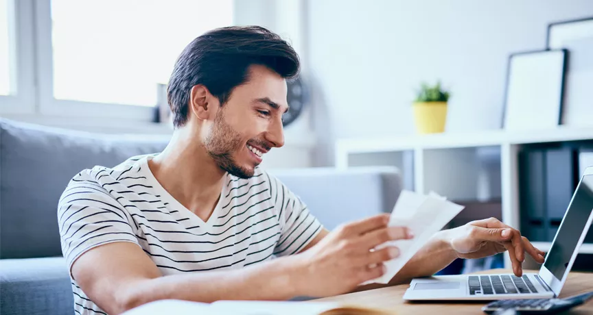 man getting to grips with his bills