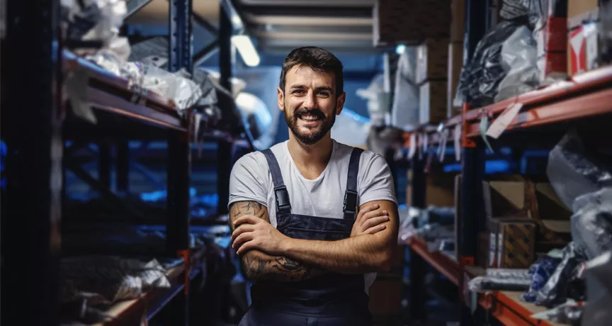 Man smiling in warehouse