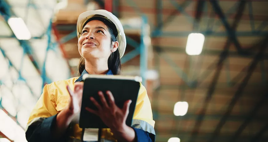 woman with clipboard in warehouse