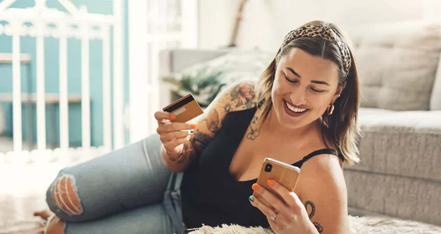 Woman shopping online via her phone