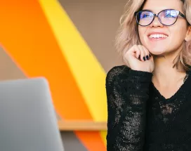 Happy employee smiling at work